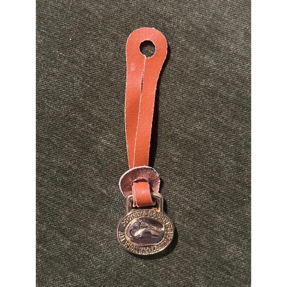 Dooney & Bourke Handbags - vintage Dooney & Bourke "All Weather Leather" bag charm 80/90s